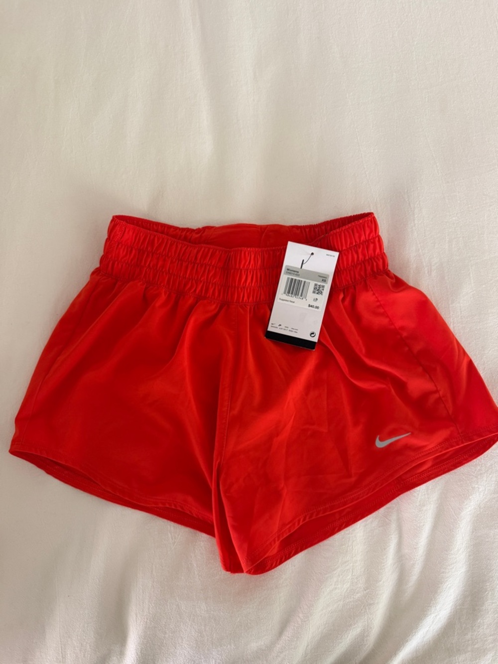 Nike Women's Bright Red Athletic Running Shorts with Silver Swoosh